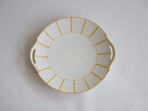 Plat jaune en porcelaine de Limoges