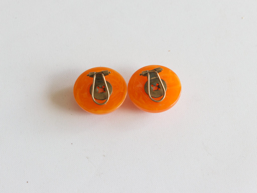 Clips d'oreilles oranges