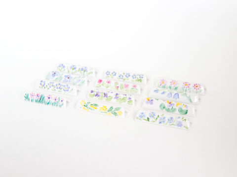 Lot de 12 porte-couteaux fleuris